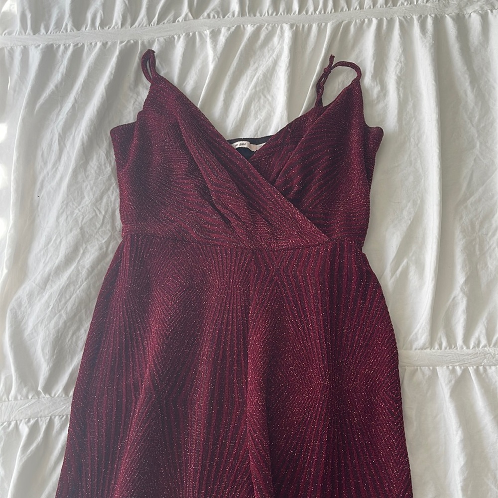 Red jumpsuit with glitter